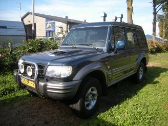 uszkodzony samochody osobowe Hyundai Galloper 2.5 TCI High Roof exceed uitvoering met oa airco, 4wd enz 2002/8
